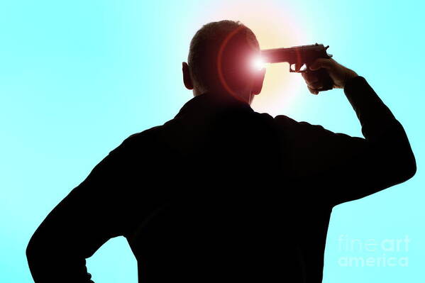 man-pointing-gun-on-head-sami-sarkis